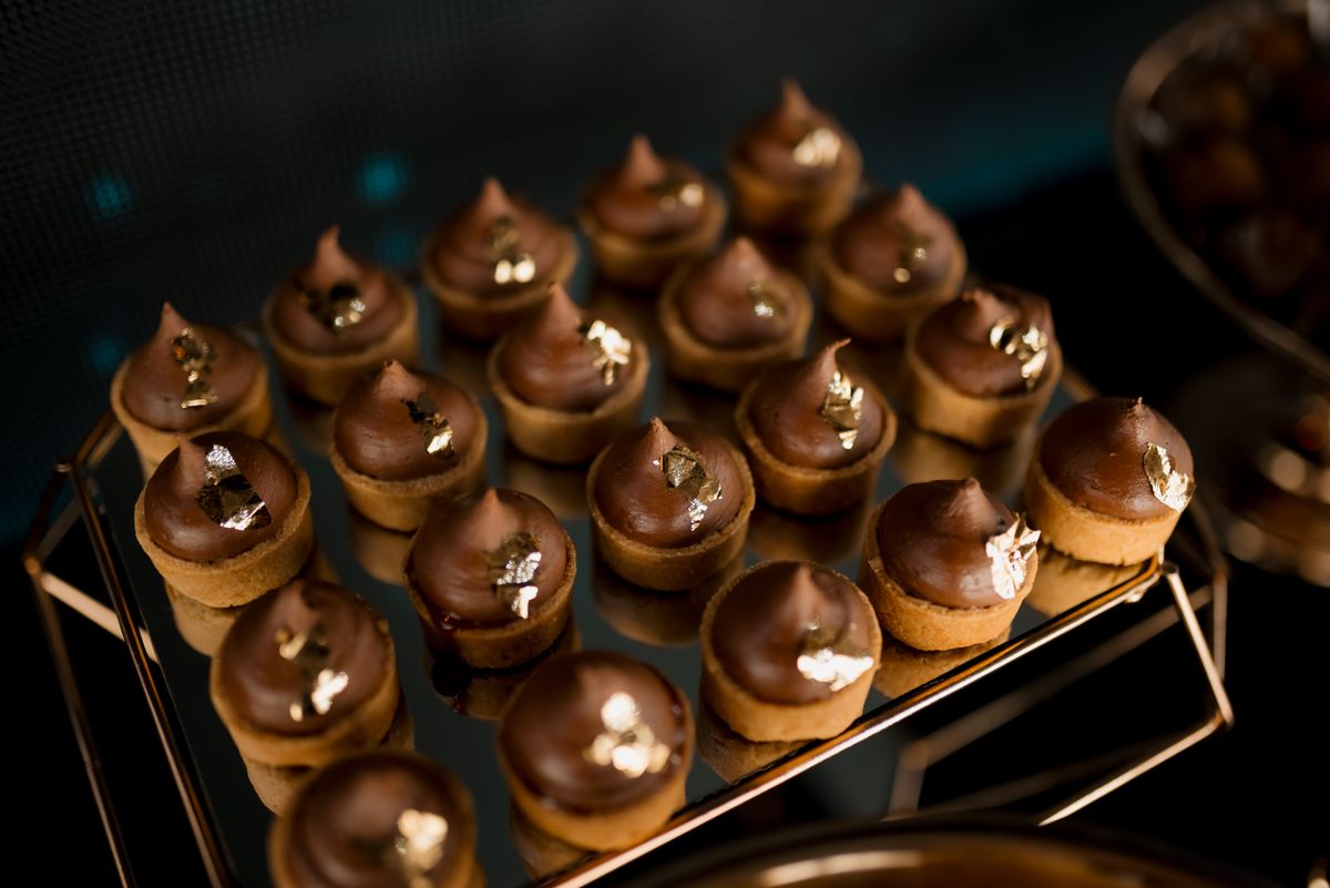 Dark chocolate desserts finished with gold leaf